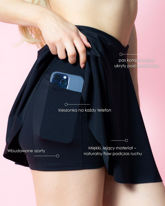 Infografika przedstawiająca funkcje czarnej spódniczki Glissmove – kompresyjne spodenki, kieszonka, wysoki stan, sportowy materiał